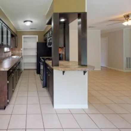 Rent this 4 bed apartment on 1418 Magnolia Drive in Plantation Oaks, College Station