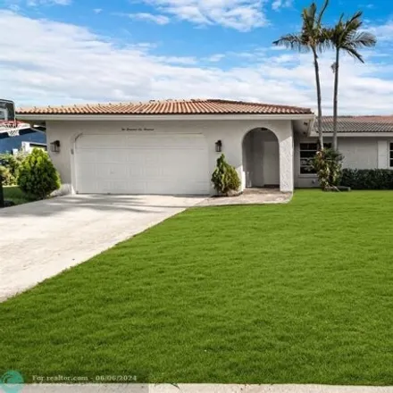 Buy this 3 bed house on 2600 NW 32nd St in Boca Raton, Florida