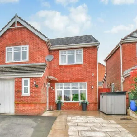 Buy this 4 bed house on Howgill Crescent in Bardsley, OL8 3WA