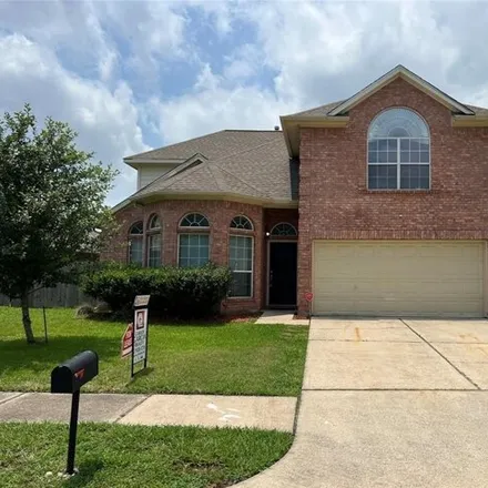 Rent this 3 bed house on 5297 Lost Cove Lane in Harris County, TX 77373