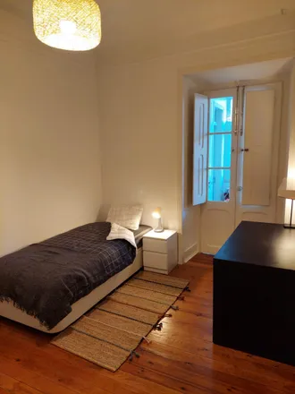 Rent this 3 bed room on Rua Frei Bartolomeu dos Mártires in 1300-166 Lisbon, Portugal