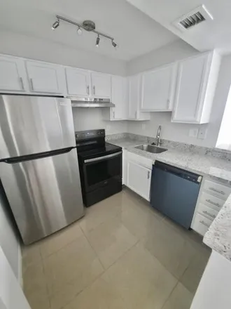 Rent this 2 bed condo on 714 Executive Center Drive in West Palm Beach, FL 33401