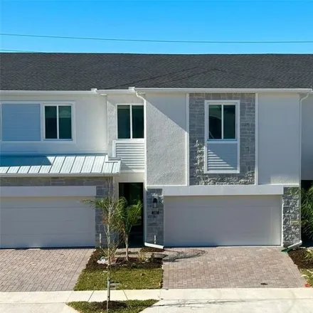 Rent this 4 bed townhouse on 164 Bogey Dr in Davenport, Florida