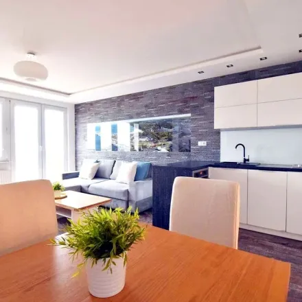 Rent this 2 bed apartment on Biuro obsługi klienta PGNiG in Obrońców Wybrzeża, 81-397 Gdynia