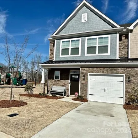 Rent this 3 bed townhouse on Rothwood Lane in Harrisburg, NC 28075