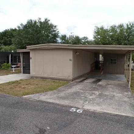 Buy this studio apartment on 15130 Timber Village Road in Groveland, FL 34736