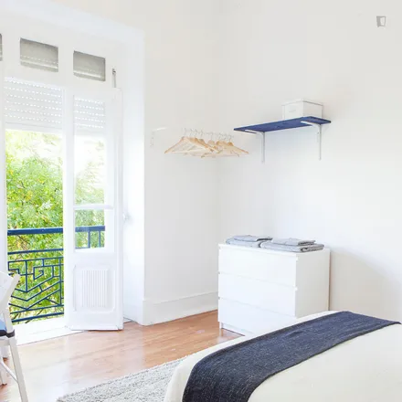Rent this 8 bed room on Avenida Ressano Garcia 11 in 1070-234 Lisbon, Portugal