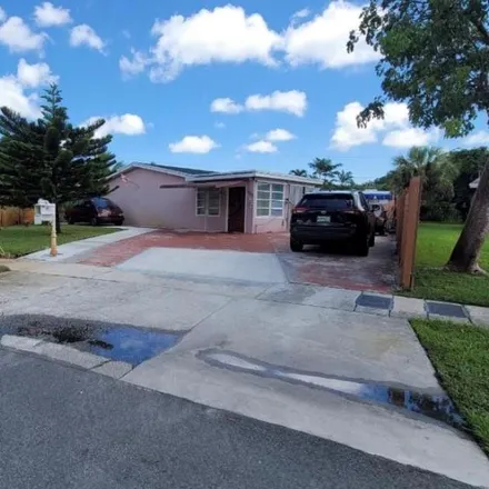 Buy this 3 bed house on 1550 Southwest 36th Way in Fort Lauderdale, FL 33312