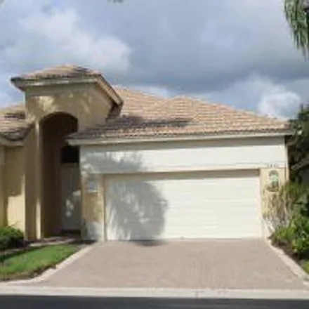 Rent this 3 bed house on 10833 Grande Boulevard in West Palm Beach, FL 33412