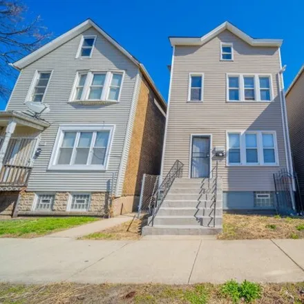 Buy this 8 bed house on 8251 South Commercial Avenue in Chicago, IL 60617