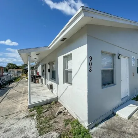 Rent this 2 bed house on 934 14th Street in West Palm Beach, FL 33401