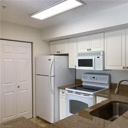 Buy this 1 bed condo on Wildwood Lakes Boulevard in Collier County, FL 34104