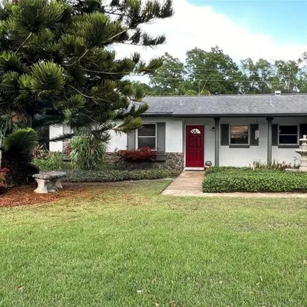 Rent this 4 bed house on 5123 Edmee Circle in Orange County, FL 32822