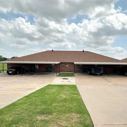 Rent this 2 bed house on 677 West Magnolia Avenue in Iowa Park, TX 76367