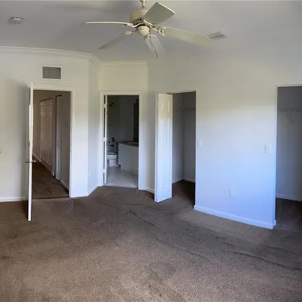 Rent this 3 bed apartment on 4513 Woodland Circle in Tamarac, FL 33319