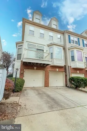 Rent this 2 bed townhouse on 21198 Domain Terrace in Cascades, Loudoun County