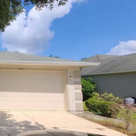 Rent this 3 bed house on 1718 Creekwater Boulevard in Port Orange, FL 32128