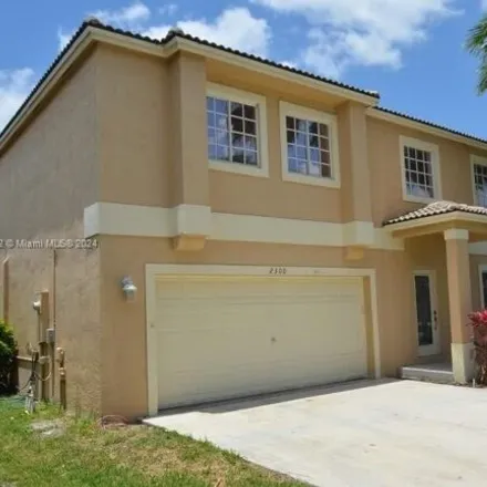 Rent this 4 bed house on New Renaissance Middle School in 10701 Southwest 25th Street, Miramar