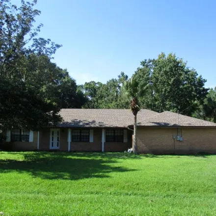 Rent this 3 bed house on 722 West Alamo Drive in Lakeland, FL 33813