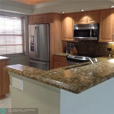 Buy this 3 bed condo on unnamed road in Pompano Beach, FL
