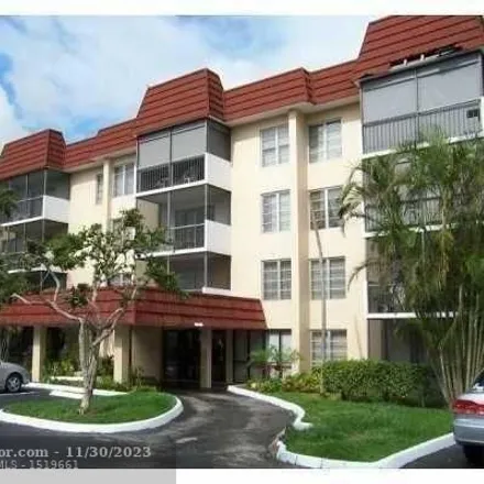Buy this 2 bed condo on 4170 Inverrary Dr Apt 409 in Lauderhill, Florida