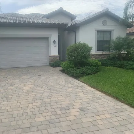 Rent this 3 bed house on 11572 Shady Blossom Drive in Fort Myers, FL 33913