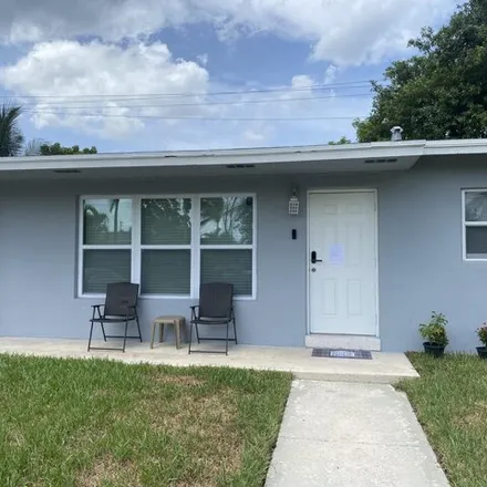 Rent this 3 bed house on 1427 W Ocean Ave in Lantana, Florida