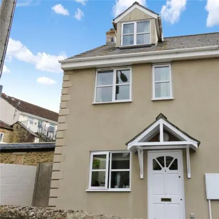 Buy this 2 bed townhouse on 4 Saxon Court in Ilminster, TA19 0DZ