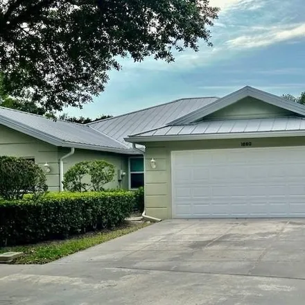 Rent this 2 bed house on 1998 Southwest Springfield Court in Palm City, FL 34990