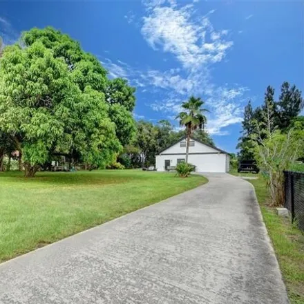 Rent this 3 bed house on 6673 Hillside Lane in Palm Beach County, FL 33462