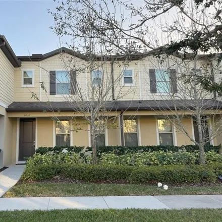 Rent this 2 bed townhouse on 5048 Walker Street in Osceola County, FL 34771