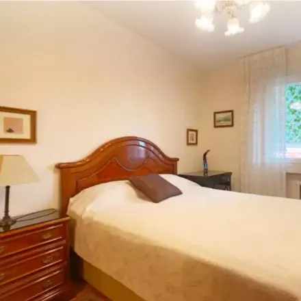 Rent this 4 bed room on Calle de Camarena in 229, 28047 Madrid