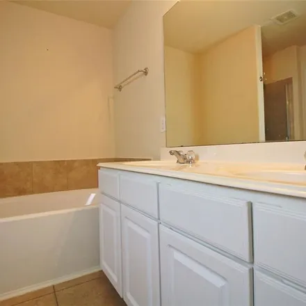 Rent this 4 bed apartment on 3038 Madison Elm Street in Katy, TX 77449