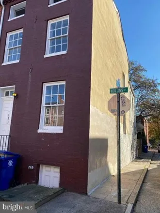 Rent this 3 bed house on 1023 Hollins Street in Baltimore, MD 21223