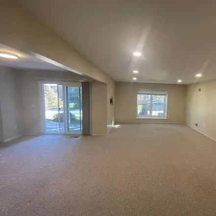 Rent this 2 bed apartment on 30977 Pointe of Woods Drive in Farmington Hills, MI 48334