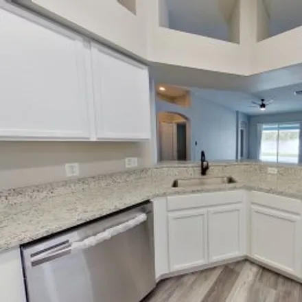 Rent this 4 bed apartment on 4204 Morning Breeze Court in Canterbury Lakes, Tampa