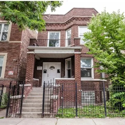 Rent this 3 bed house on 1006 N Lawndale Ave Unit 1 in Chicago, Illinois