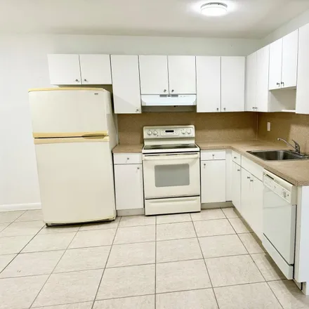 Rent this 2 bed apartment on 241 Northwest 40th Street