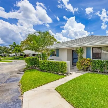 Buy this 2 bed house on 201 Club Dr Unit 201 in Palm Beach Gardens, Florida