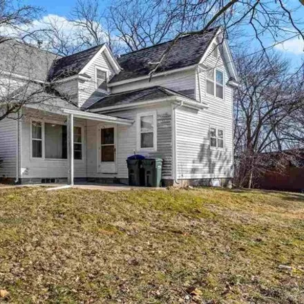 Buy this 4 bed house on 715 West Benton Street in Iowa City, IA 52246