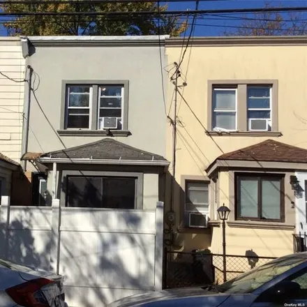 Buy this 2 bed house on 153-15 118th Avenue in New York, NY 11434