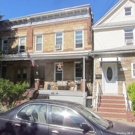 Buy this 5 bed townhouse on 86-14 89th Street in New York, NY 11421