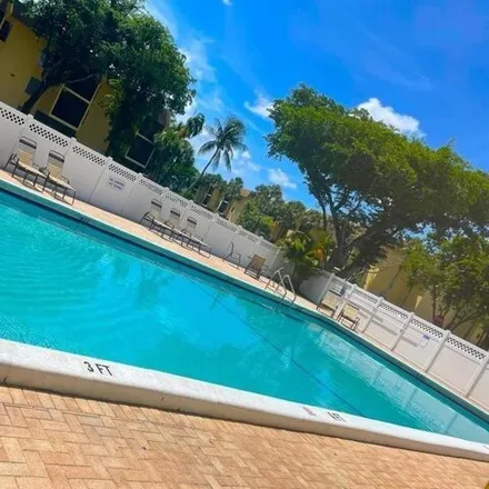 Rent this 2 bed condo on 480 NW 20th St Unit 1030 in Boca Raton, Florida