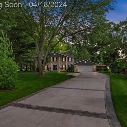 Buy this 4 bed house on 9515 Steep Hollow Drive in White Lake Charter Township, MI 48386