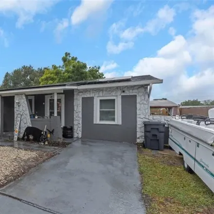 Buy this 4 bed house on 8526 Tidewater Trail in Clair-Mel City, Hillsborough County