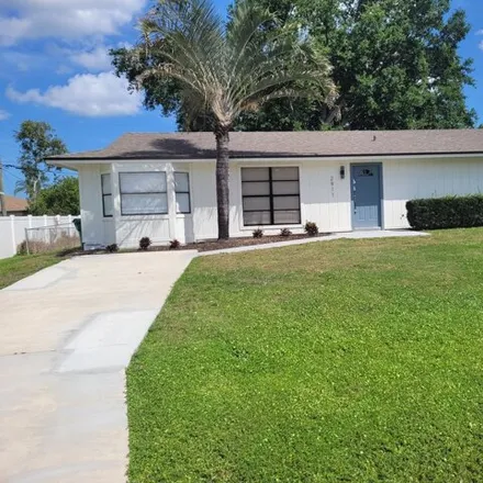 Rent this 3 bed house on 2921 Southwest Lucerne Street in Port Saint Lucie, FL 34953