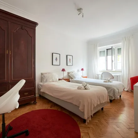 Rent this 7 bed room on Rua João de Menezes 13 in 1900-179 Lisbon, Portugal