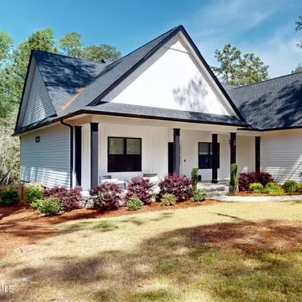 Buy this 4 bed house on 82 Arbutus Lane in Whispering Pines, Moore County