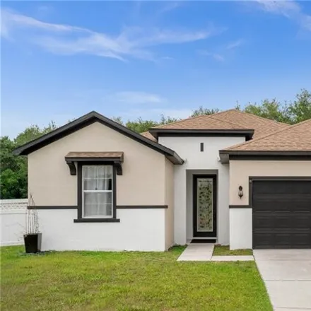 Buy this 3 bed house on 802 Neptune Pointe Lane in Osceola County, FL 34744