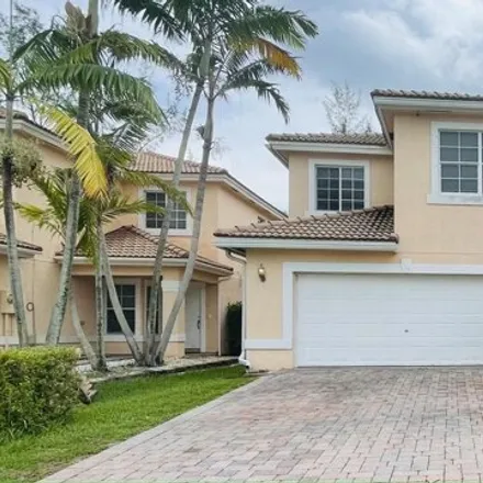 Rent this 4 bed house on 6262 Adriatic Way in Lake Belvedere Estates, Palm Beach County